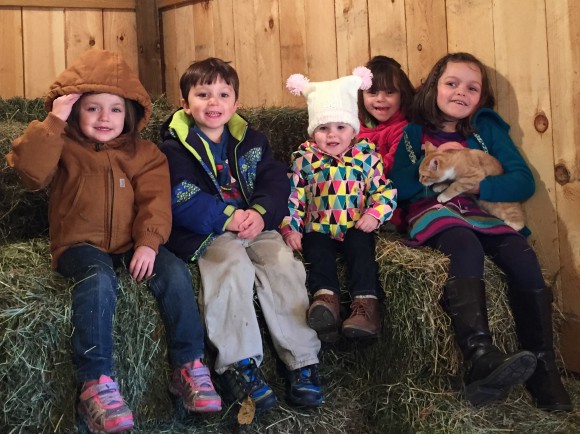 Grandkids in hay stall